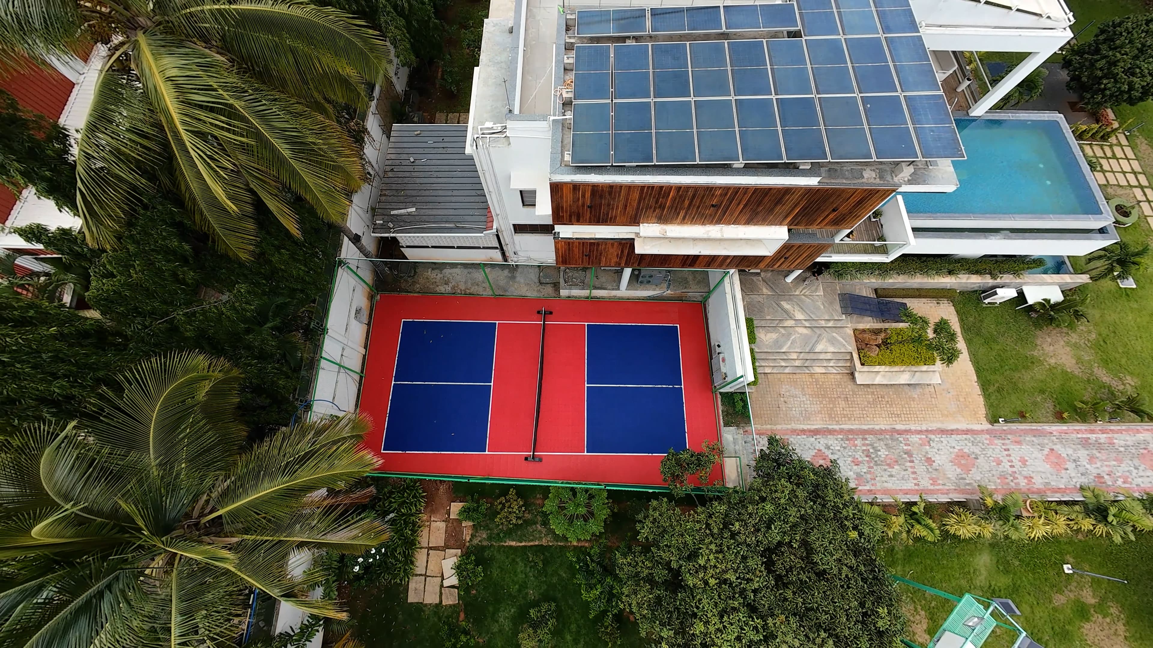 Aerial view of sports court and pool
